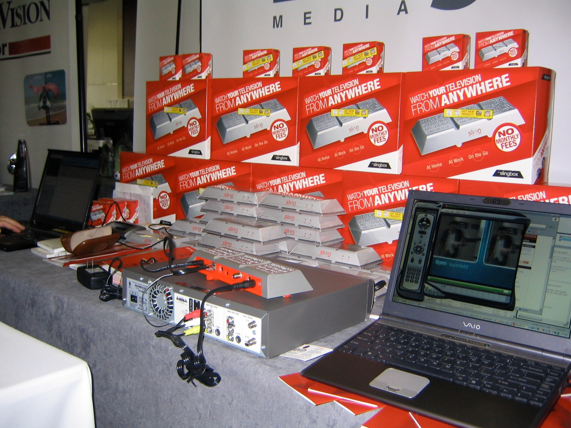 Slingbox retail display with product boxes and hardware